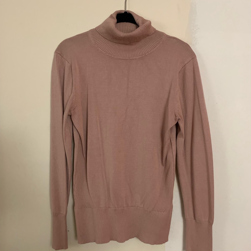 Pink cable and gauge turtleneck